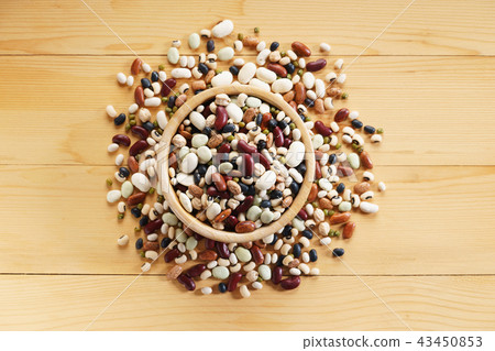 mixed beans on wooden background 43450853