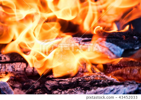 Wooden planks on fire close up background 43452033