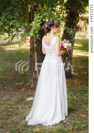 beautiful bride in wedding white dress beautiful bride in wedding white dress 43453353