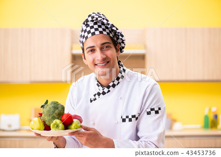 Young professional cook preparing salad at home Young professional cook preparing salad at home 43453736