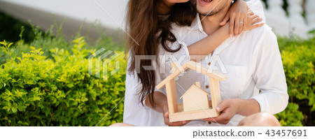 Young couple planning to buy a house concept. 43457691