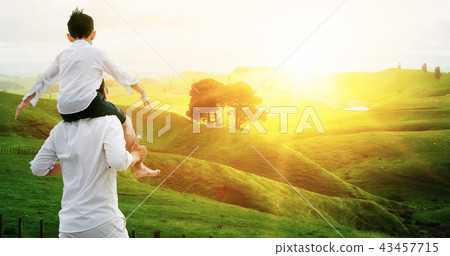 Happy father carry son on shoulders on vacation. 43457715