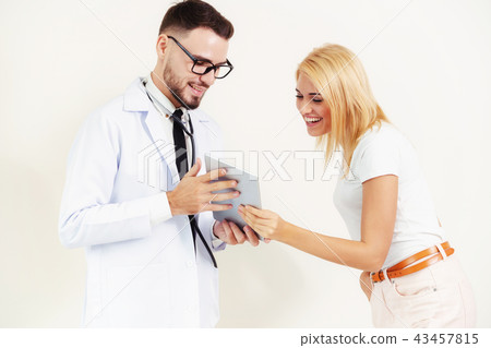 Male Doctor and Female Patient in Hospital. 43457815