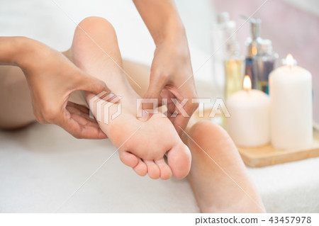 Foot spa massage treatment in luxury spa resort. 43457978