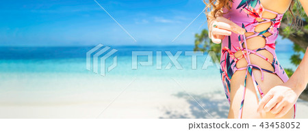 Happy young woman at beach in summer vacation. 43458052