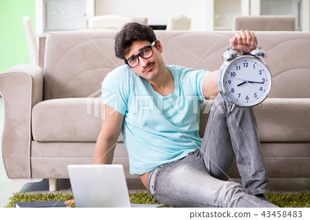 Student preparing for university exams at home in time managemen 43458483