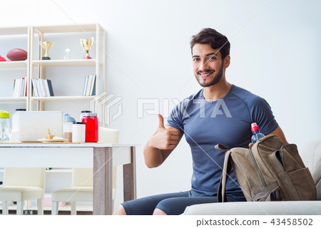 Young man getting ready for gym sports 43458502