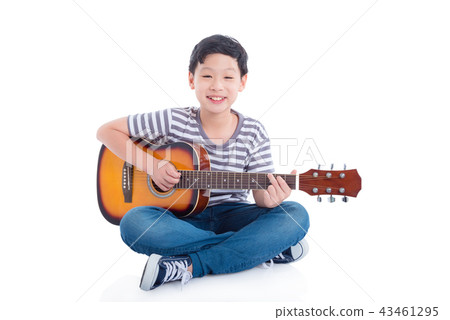 boy playing guitar and smiles over white boy playing guitar and smiles over white 43461295