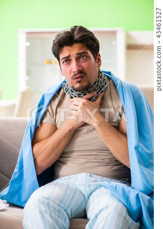 Sick young man suffering from flu at home 43461527