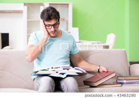 Student preparing for university exams at home 43463290