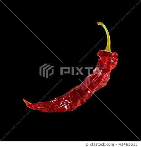 Dry chili pepper on black background. Dried vegetable. 43463613