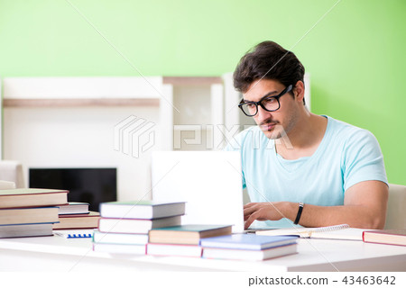 Student preparing for university exams at home Student preparing for university exams at home 43463642