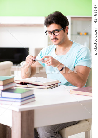 Student preparing for university exams at home Student preparing for university exams at home 43463647