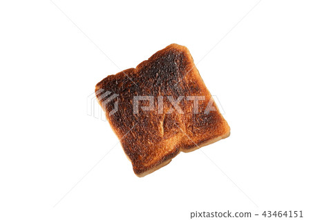 Burnt toast on white backround Burnt toast on white backround 43464151