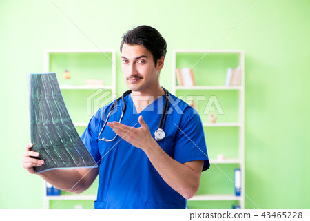Young doctor working in the hospital 43465228
