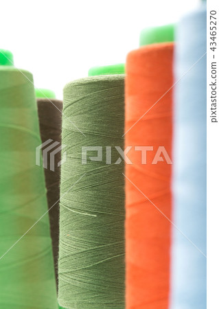 Thread, laces, colorful colourful bobbins of thread Thread, laces, colorful colourful bobbins of thread 43465270