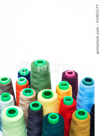 Thread, laces, colorful colourful bobbins of thread Thread, laces, colorful colourful bobbins of thread 43465277