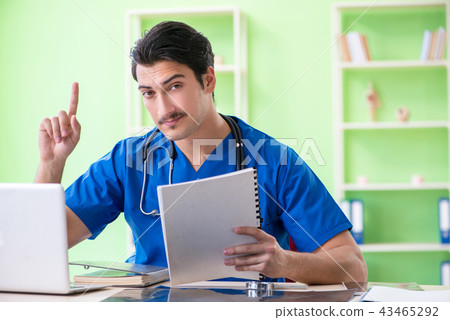 Young doctor working in the hospital 43465292