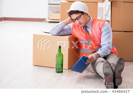 Delivery man drunk at work 43466427