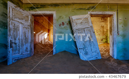 Sand has invaded and taken over these rooms 43467679