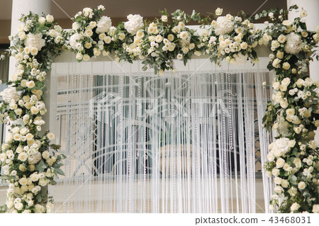 Arch decorated with flowers at the wedding caremony 43468031