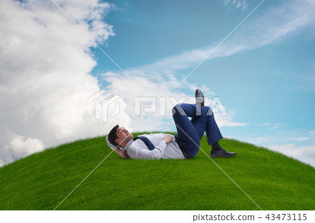 Businessman employee enjoying time off work Businessman employee enjoying time off work 43473115