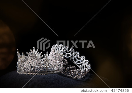 Diamond Silver Crown for Miss Pageant Beauty queen Contest, Crystal Tiara jewelry decorated gems stone and black velvet fabric cloth, photography copy space for text logo 43474866