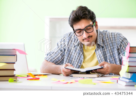 Student preparing for university exams with many conflicting pri Student preparing for university exams with many conflicting pri 43475344