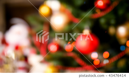 Blurred image of decorated Christmas tree at living room 43476414