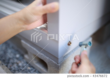 Do-it-yourself (body parts faceless do-it-yourself DIY driver assembling storeroom warehouse house construction) 43476672