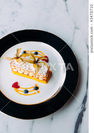 Millefeuilles French puff pastry on elegant plate 43478710