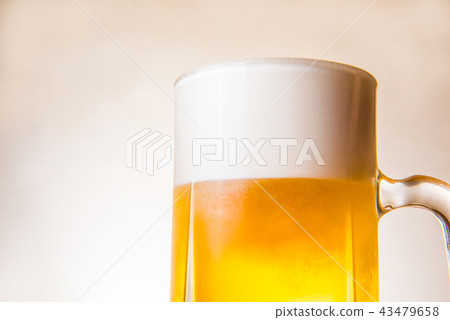 Draft beer in a mug Draft beer in a mug 43479658