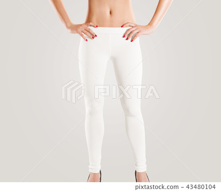 Woman wear blank white leggings mockup, isolated on grey. Woman wear blank white leggings mockup, isolated on grey. 43480104