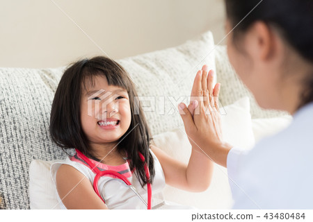Cute girl on consultation at the pediatrician 43480484