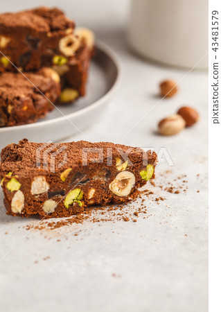 Italian dessert panforte with nuts, chocolate Italian dessert panforte with nuts, chocolate 43481579