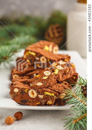 Italian Christmas dessert panforte with nuts Italian Christmas dessert panforte with nuts 43481583