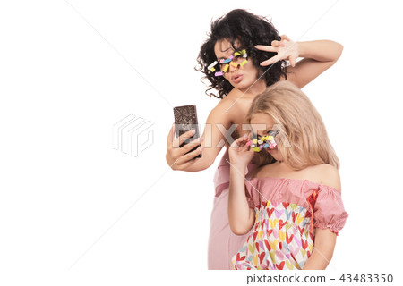 Funny Mom and daughter do selfie Isolated on white 43483350
