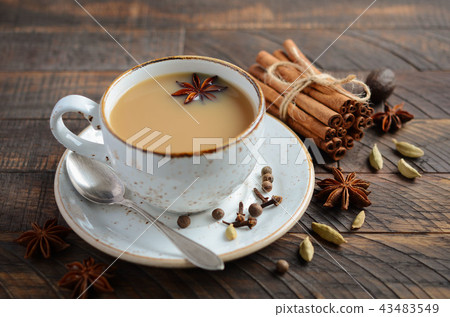 Indian masala chai tea. Spiced tea with milk. 43483549