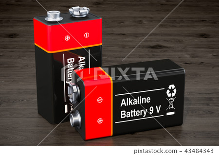 9V batteries on the wooden background 43484343