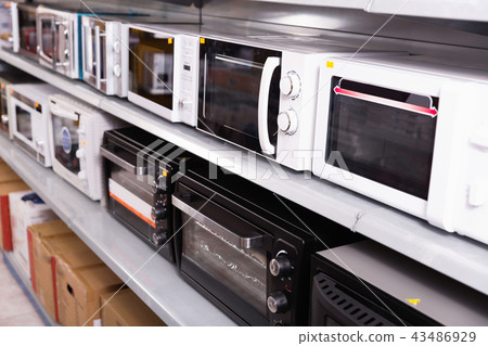 Image of assortment of a kitchen microwave at household appliances store Image of assortment of a kitchen microwave at household appliances store 43486929