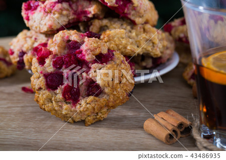 Closeup of oat cookies with tea Closeup of oat cookies with tea 43486935