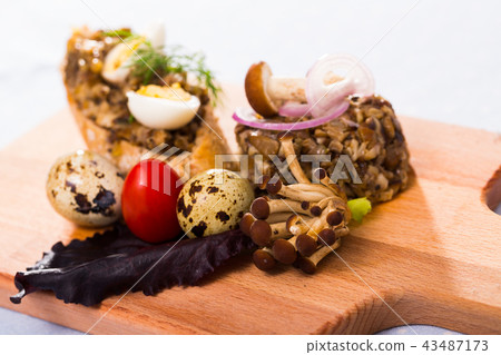 Delicious pate from button mushrooms with onion, quail eggs and greens 43487173