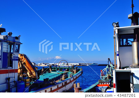 Mt. Fuji seen from Nagai fishing port in Miura Peninsula Mt. Fuji seen from Nagai fishing port in Miura Peninsula 43487201
