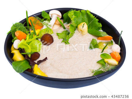 Cream soup with mushrooms and vegetables 43487236
