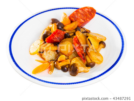 Delicious fried potatoes with honey fungus mushrooms and sausage Delicious fried potatoes with honey fungus mushrooms and sausage 43487291