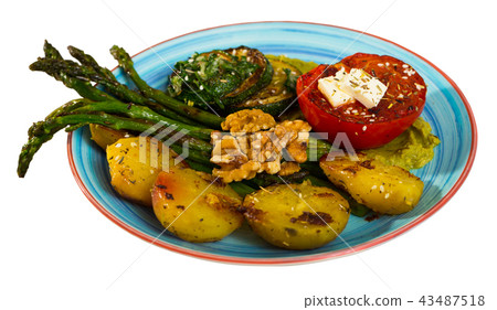 Baked vegetables with welnut is tasty vegeterian dish Baked vegetables with welnut is tasty vegeterian dish 43487518