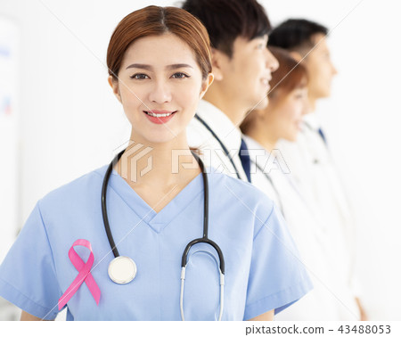 medical team with pink breast cancer awareness 43488053