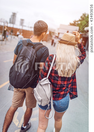 Strolling casual couple on street 43493656