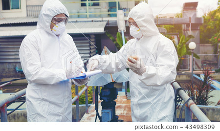 Scientists are examining the quality of water Scientists are examining the quality of water 43498309
