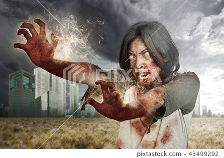 Spooky zombie man with wounded face Spooky zombie man with wounded face 43499292